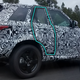Illustration for article titled What the Hell Is Going on With This Stumpy Range Rover Prototype?em/em